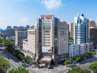 una vista aérea de una ciudad con edificios altos en Vienna International Hotel Taizhou Wenling Branch, en Taizhou