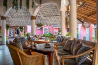 Posezení v ubytování PinkCoco Uluwatu - Constant Surprises & for Cool Adults Only