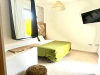 A television and/or entertainment centre at Cloud Tropical - Piscina climatizada - Gym Privado