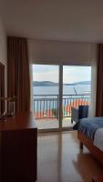 Postel nebo postele na pokoji v ubytování apartman Antonio Trogir