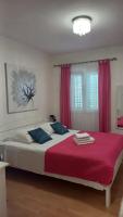 Postel nebo postele na pokoji v ubytování apartman Antonio Trogir