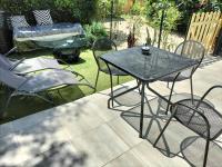 Ogród w obiekcie Maison dans une résidence de vacances