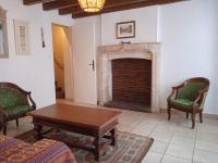 Posedenie v ubytovaní Charming detached 2 bedroom ancient house in medieval quarter of a small town in the Pays de la Loire, France