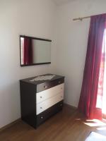 Televízia a/alebo spoločenská miestnosť v ubytovaní Apartments Marija