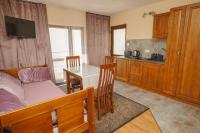 Kuchyňa alebo kuchynka v ubytovaní APARTAMENTY PASJA -2 minuty do plaży