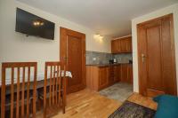 Kuchyňa alebo kuchynka v ubytovaní APARTAMENTY PASJA -2 minuty do plaży