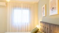 Postel nebo postele na pokoji v ubytování Luxury Apartment Dos Aceras