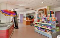 a store aisle with a grocery store with a pharmacy at 2 Bedroom Beautiful Home In La Faute-sur-mer in La Faute-sur-Mer