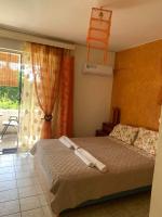 A bed or beds in a room at Corfu town Kanoni apartment