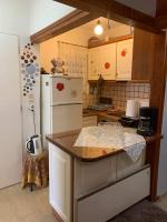 A kitchen or kitchenette at Corfu town Kanoni apartment