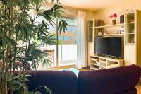 TV a/nebo společenská místnost v ubytování BEAUTIFUL APARTMENT WITH POOL TOSSa 2