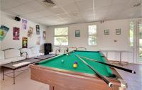a billiard room with a pool table at 2 Bedroom Beautiful Home In La Faute-sur-mer in La Faute-sur-Mer
