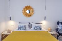 A bed or beds in a room at Alko Apartments