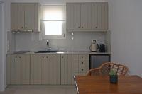 A kitchen or kitchenette at Alko Apartments