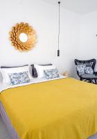 A bed or beds in a room at Alko Apartments