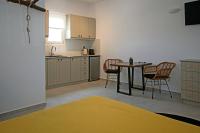 A kitchen or kitchenette at Alko Apartments