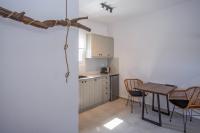 A kitchen or kitchenette at Alko Apartments