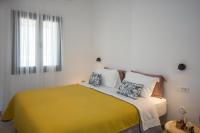 A bed or beds in a room at Alko Apartments