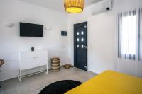 A bed or beds in a room at Alko Apartments