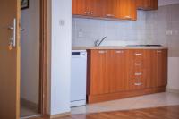 Kuchyň nebo kuchyňský kout v ubytování Apartments Branka