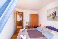 Postel nebo postele na pokoji v ubytování Apartments Branka