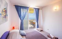 Postel nebo postele na pokoji v ubytování Apartments Branka