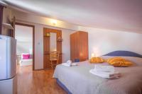 Postel nebo postele na pokoji v ubytování Apartments Branka