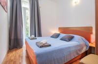 Postel nebo postele na pokoji v ubytování Apartments Branka