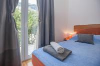 Postel nebo postele na pokoji v ubytování Apartments Branka