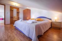 Postel nebo postele na pokoji v ubytování Apartments Branka