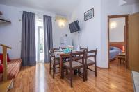 Postel nebo postele na pokoji v ubytování Apartments Branka