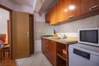 Kuchyň nebo kuchyňský kout v ubytování Apartments Branka
