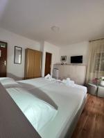 Posteľ alebo postele v izbe v ubytovaní Residence Bella