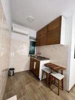 Kuchyňa alebo kuchynka v ubytovaní Residence Bella