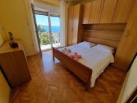 Posteľ alebo postele v izbe v ubytovaní Apartment in Crikvenica 40895