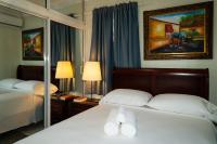 Postel nebo postele na pokoji v ubytování Villa Gumio 2BR Apt -7min walk Boca Chica Beach apts