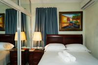 Postel nebo postele na pokoji v ubytování Villa Gumio 2BR Apt -7min walk Boca Chica Beach apts