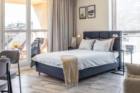 Posteľ alebo postele v izbe v ubytovaní apartamenty-wroc Old Town Residence