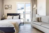Posteľ alebo postele v izbe v ubytovaní apartamenty-wroc Old Town Residence
