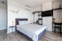 Posteľ alebo postele v izbe v ubytovaní apartamenty-wroc Old Town Residence