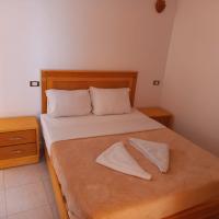 A bed or beds in a room at Nile Sunrise Flats