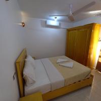 A bed or beds in a room at Nile Sunrise Flats