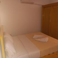 A bed or beds in a room at Nile Sunrise Flats