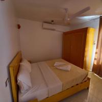 A bed or beds in a room at Nile Sunrise Flats