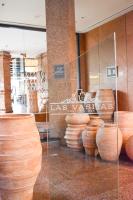 a display of vases in a glass case at Sheraton Pilar Hotel & Convention Center in Pilar
