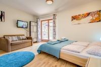 Posteľ alebo postele v izbe v ubytovaní Apartamenty Smrekowa Tatry Zakopane