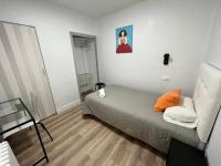 Posteľ alebo postele v izbe v ubytovaní Hostal ARS