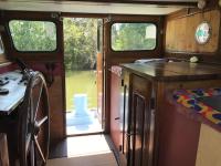 a view of the inside of a kitchen in a vehicle at Péniche Match in Arles