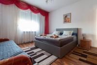 Posteľ alebo postele v izbe v ubytovaní Apartments Ruža Dragove Dugi otok