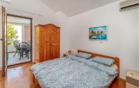 Łóżko lub łóżka w pokoju w obiekcie 4 Bedroom Gorgeous Home In Dobrinj
